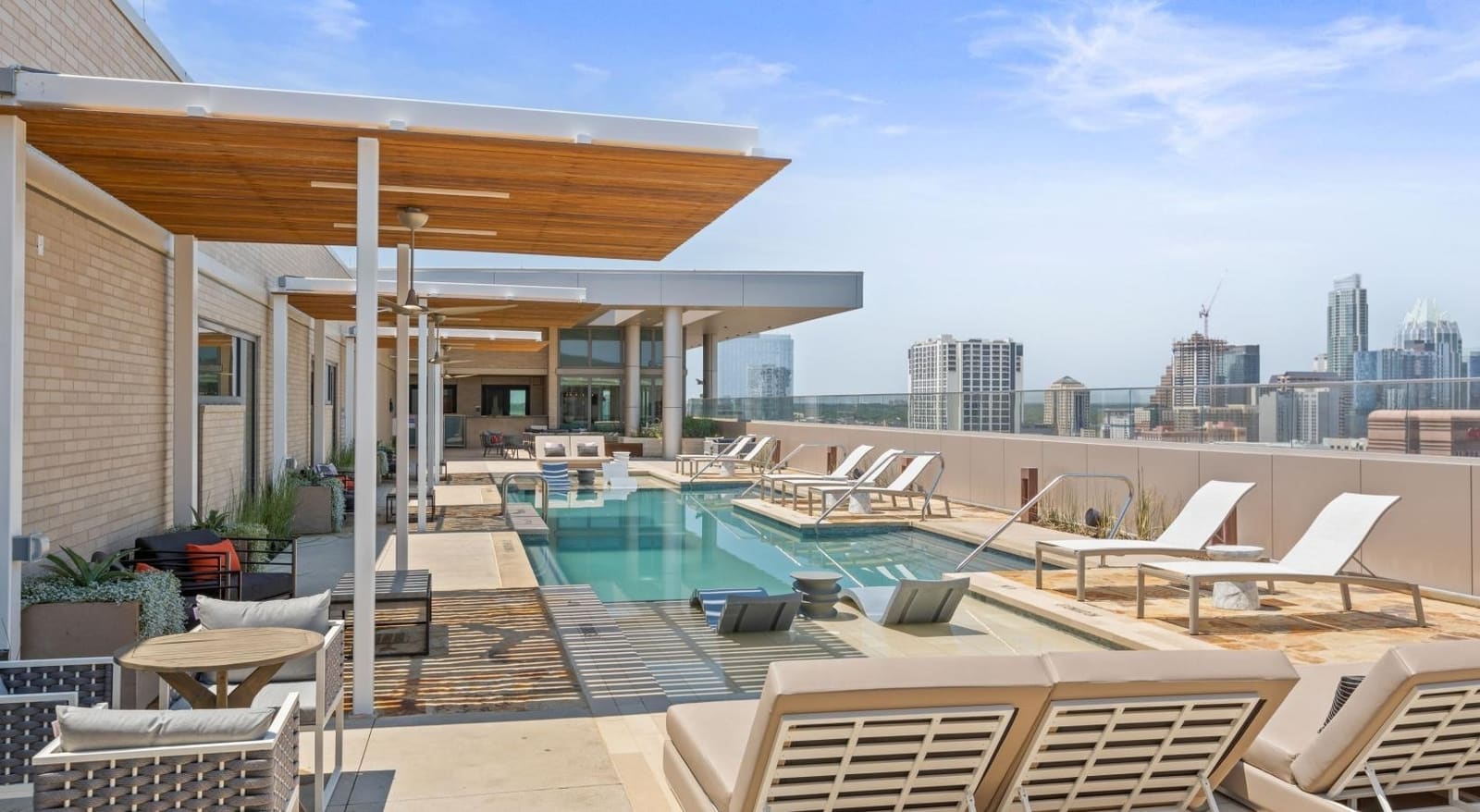 Indoor basketball court and two pool decks photo 8 in East Austin