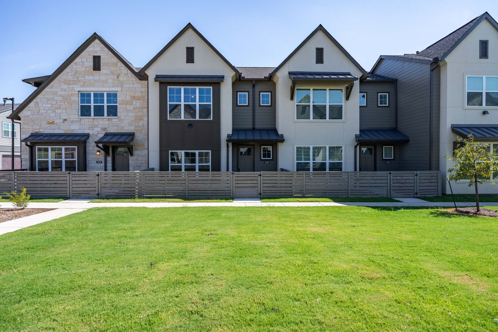 Contemporary Townhomes with Private Yards photo 3 in Leander, TX